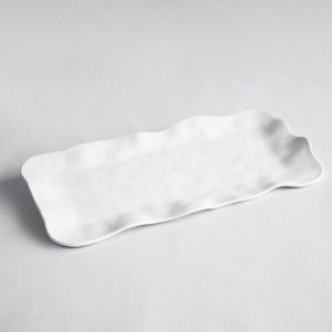 Matte white melamine serving tray with soft rounded edges. Made by Beatriz Ball. 13.25 x 9.75 inches.