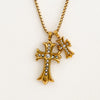 Two gold cross pendants adorned with clear CZ stones on a delicate gold box chain necklace. Cross height 1 1/8" and 5/8".