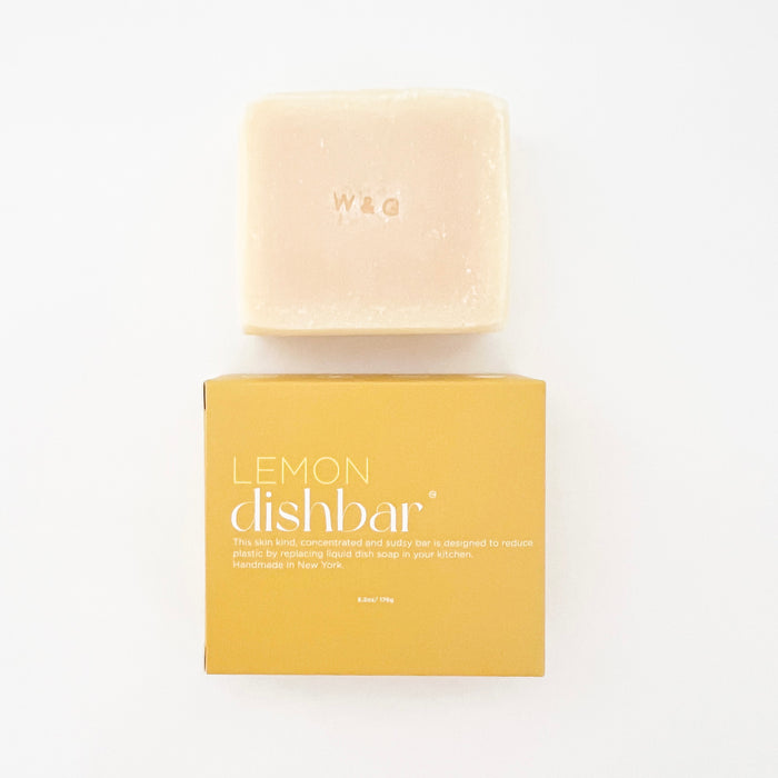 Lemon Dishbar. Solid dish soap bar packaged in a lemon yellow box. Lemon scented, made with all natural ingredients. 3.75 x 3.375