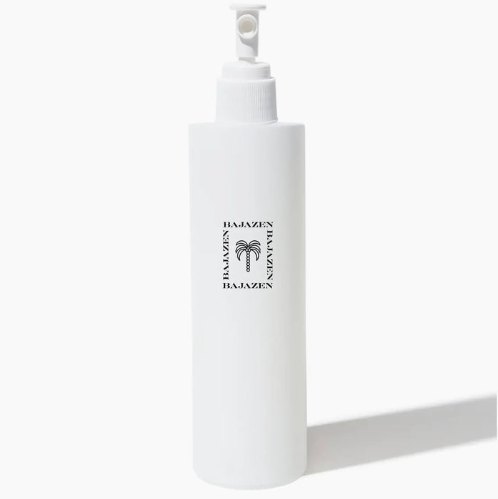 White spray bottle of MAKE WAVES sea salt hair tonic by Baja Zen. 5.5 oz. 