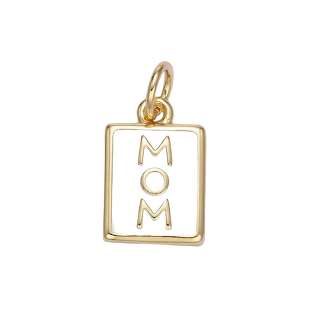 White enamel tag charm with MOM in gold, framed in gold on white background.