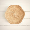 Round scallop woven tray hand crafted in natural Manila Hemp. 12 inch diameter. Hanging loop on back for wall display.