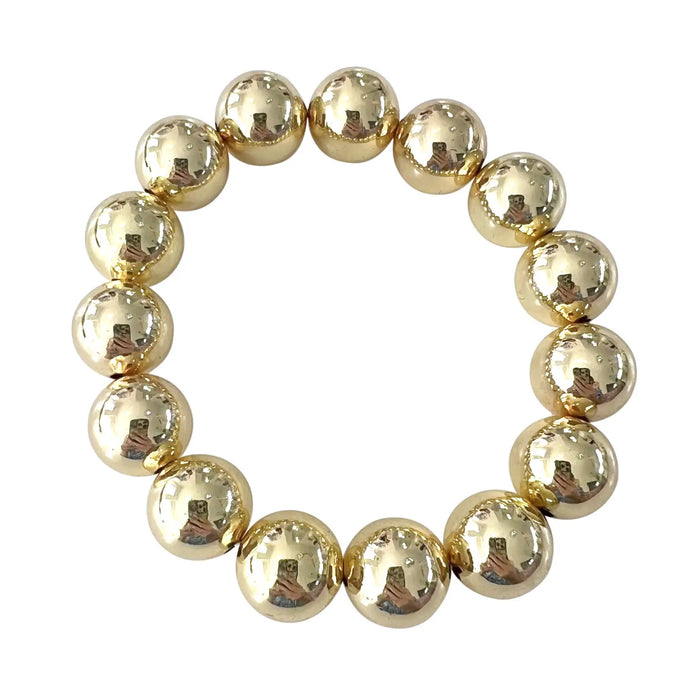 Gold ball beaded bracelet. 7 inch diameter, stretch. 18K gold plated hollow beads.