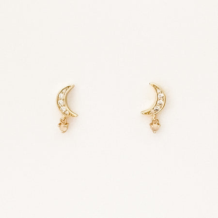 Moon Drop earrings. Two small gold crescent moon earrings encrusted with sparkling CZ stones and a delicate mother of pearl drop. 18K gold plating over brass, sterling silver posts, CZ stones, mother of pearl. Hypoallergenic and lead free. 1/2" length