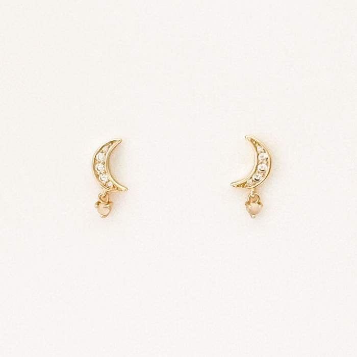 Moon Drop earrings. Two small gold crescent moon earrings encrusted with sparkling CZ stones and a delicate mother of pearl drop. 18K gold plating over brass, sterling silver posts, CZ stones, mother of pearl. Hypoallergenic and lead free. 1/2" length