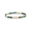 White, faux turquoise and gold stretch bracelet made using flat, square "Tila" beads. One size fits most.