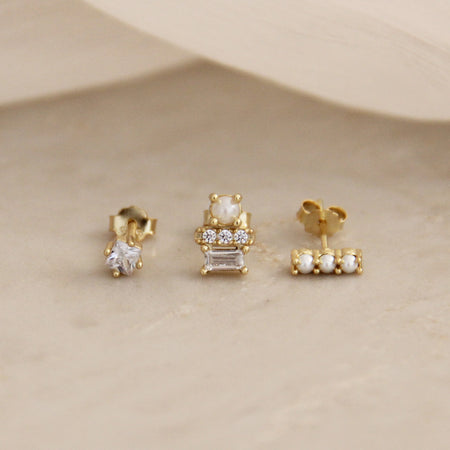 Set of 3 stud earrings made with tiny white seed pearls, clear CZ stones, 18k gold over 925 sterling silver. Hypoallergenic. Lead and Nickel free.