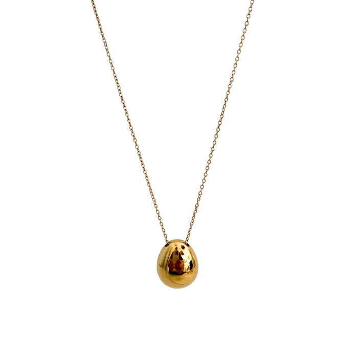 Gold  rounded pebble shaped pendant on a delicate gold chain. 22 inch length. Made of hypo allergenic stainless steel with gold plating. Sweat, water and tarnish resistant. 