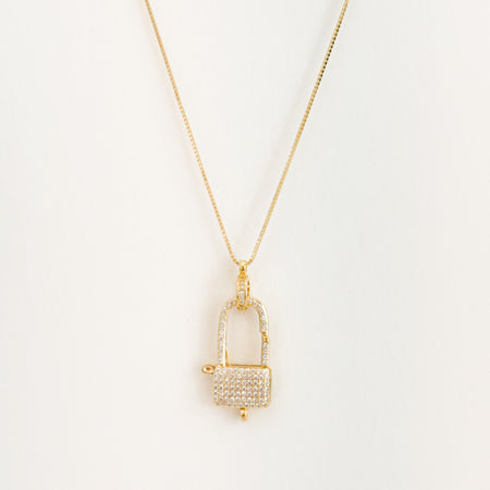 Delicate gold filled box chain necklace with a pave' encrusted gold lock carabiner.