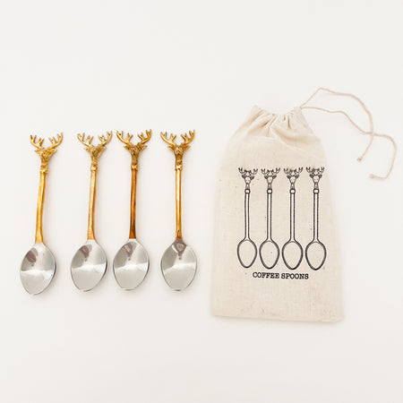 Set of 4 Reindeer spoons. Made of stainless steel with a brass finish. Perfect for holiday entertaining serving dips or stirring hot chocolate. Comes in a drawstring muslin pouch. Spoon 5.5" length. 