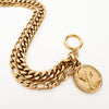 Rhodes double chain toggle bracelet with vintage inspired coin charm. Water, sweat and tarnish resistant jewelry. Made of gold plated marine grade stainless steel with protective coating. 7.5 inches.