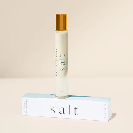 Roll-on perfume bottle of SALT fragrance with matching box. Fragrance notes of Citrus, Bergamot and Sea Salt. 10mL