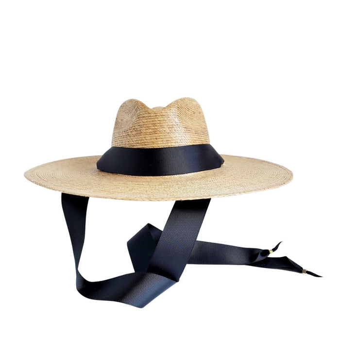 Natural straw hat with wide brim and a black Petersham ribbon/tie.
