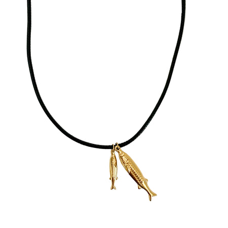 Two gold fish pendants on a black waxed cotton cord. Water, sweat and tarnish resistant. 16 inch length.
