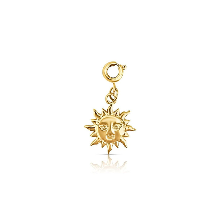 Sol Charm. A  golden sun charm with an etched face hangs. Ring clasp on end is intended to layer onto chain link necklaces for a build your own charm necklace. Gold plated on hypoallergenic stainless steel. Water, sweat and tarnish resistant. 27mm  15mm.