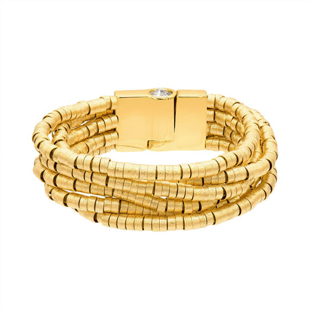 A gold multi-strand beaded wrap bracelet with a rectangular gold magnetic clasp  shown on a plain white background. Designed by Marcia Moran. 18k gold plated over brass.