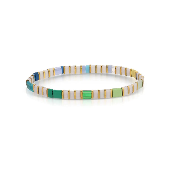 White, gold and mulit color greens and blues stretch bracelet made using flat, square "Tila" beads. One size fits most.