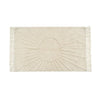 Sunshine rug. Softly tufted cream rug featuring a tufted sun with rays. Made of tufted cotton with hand knotted tassel fringe on each end. Measures 50" x 30". Machine wash cold, tumble dry low.