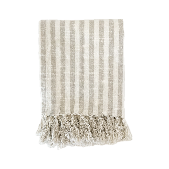 Sydney hand towel class be in a classic ecru and sand bengal stripe. 100% cotton flat weave Turkish towel with hand knotted fringe tassels. Measures: 20" x 28".