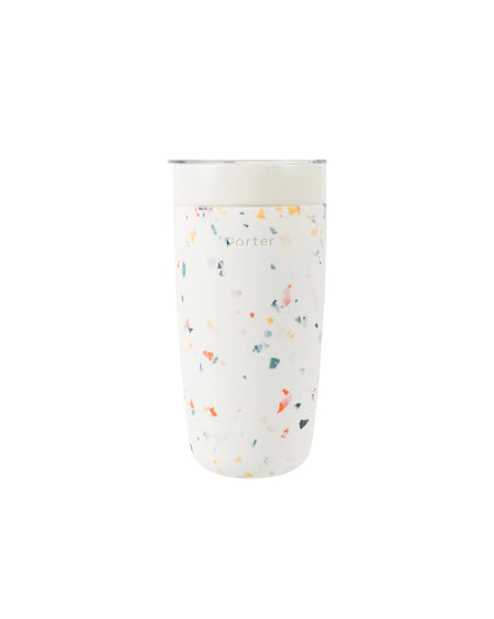 Terrazzo insulated To-Go tumbler. Ceramic coated insulated stainless steel tumbler with sealed press on lid for splash free sipping. Keeps drinks hot or cold on the go. Exterior has cream silicone sleeve with a multicolored Terrazzo pattern.  20 fl oz/590 ml. Dishwasher safe. BPA free.