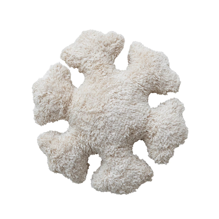 Cream tufted pillow in the shape of a snowflake. 15" diameter, 4" thick.