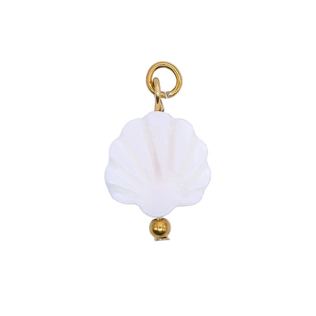 White shell charm with gold accents on a white background