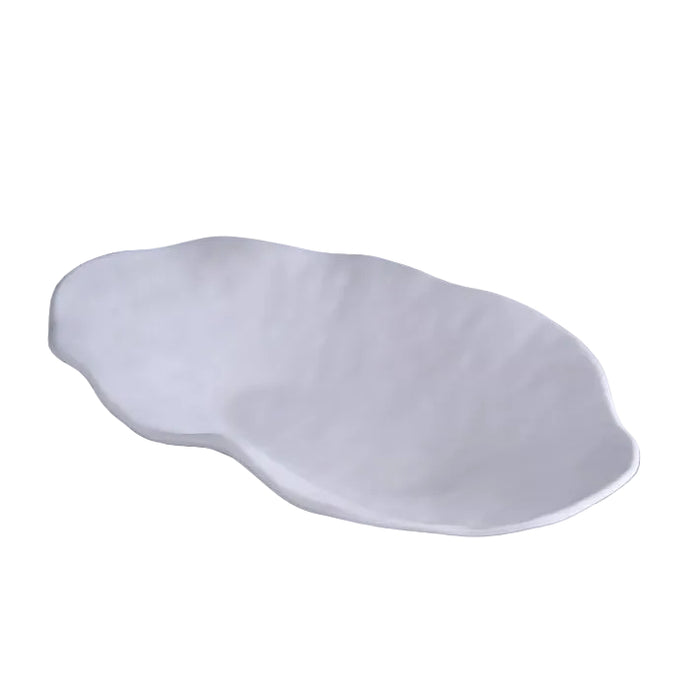 Shallow oval serving bowl in matte white melamine. Made by Beatriz Ball. 22.5 x 13 x 3.75 inches.