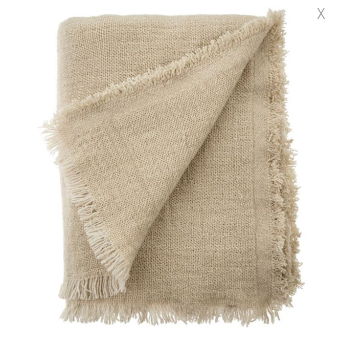 Hygge wool blend throw in a soft creamy taupe. Meaures 55" x 65" with gently frayed edges. Dry clean only.