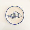 Pisces Stoneware Plate. 7" cream speckled stoneware plate with hand painted cobalt blue border and fish design. Perfect for tapas or small plates.