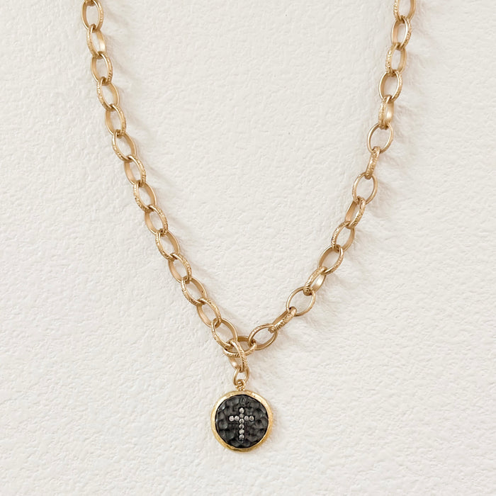 Gold chain necklace with a small smoke pearl disk pendant featuring cross made of diamond chips. 14k gold plated on 925 silver. 18.5" length. Made by Bittersweet Designs.