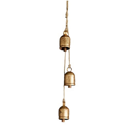 Decorative brass bells strung on jute rope. Three tin bells with brushed brass finish and raw wood chime make a festive addition to your holiday decor. Total length approximately 21". Each bell measures 2" diameter, 3/5" length.