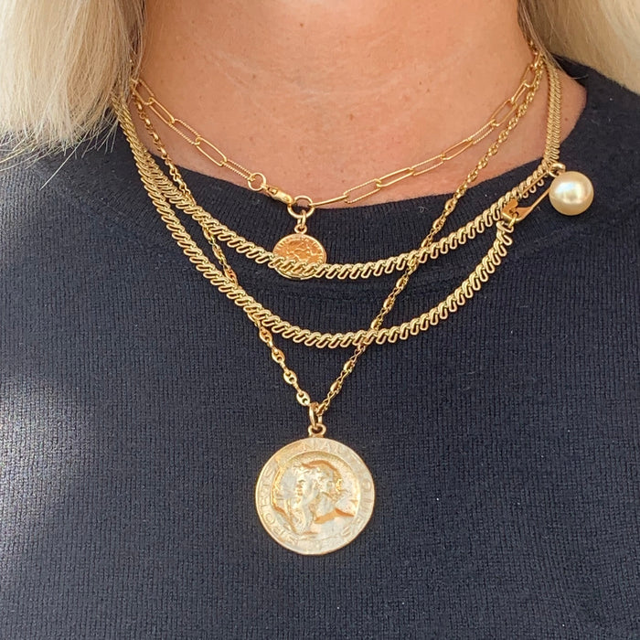 Vintage Coin Necklace shown layered with the small vintage coin necklace. We love layering  gold chain and charms. Each sold separately.