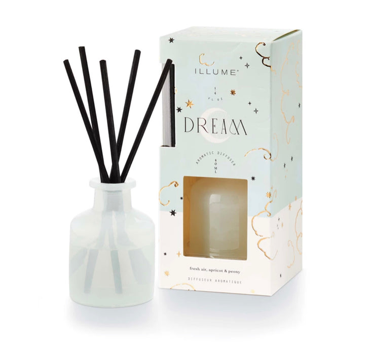 Dream mini diffuser set by Illume. Dream is the fragrance of fresh air, apricot and peony. Includes glass vessel, 1.4 fluid oz of fragrance oil and reed diffuser sticks.