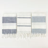Set of 3 blue & white stripe hand towels are perfect for the coastal kitchen or bathroom. Includes on dark blue/white bold stripe, dark blue/white fine stripe and light blue/white bold stripe. Made of 100% cotton with a twisted tassel  fringe on one side.
