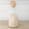 Clear glass decanter/canister with natural wood ball stopper. Artisan made, holds 42 oz., 11" tall.