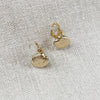 Clamshell Huggie Earrings in 24k plated gold. Designed by Katie Waltman.