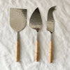 Rattan cheese knives made of hammered stainless steel. Set of 3.
