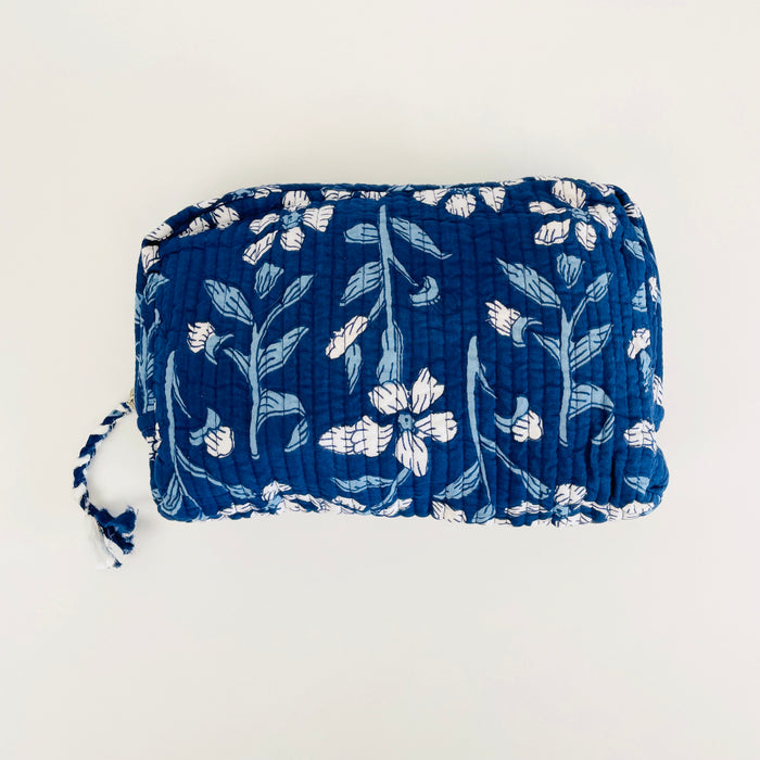 Travel Pouch in "indigo floral" block print from By the Sea Organics. Made of soft quilted 100% organic cotton. 10" x 7"