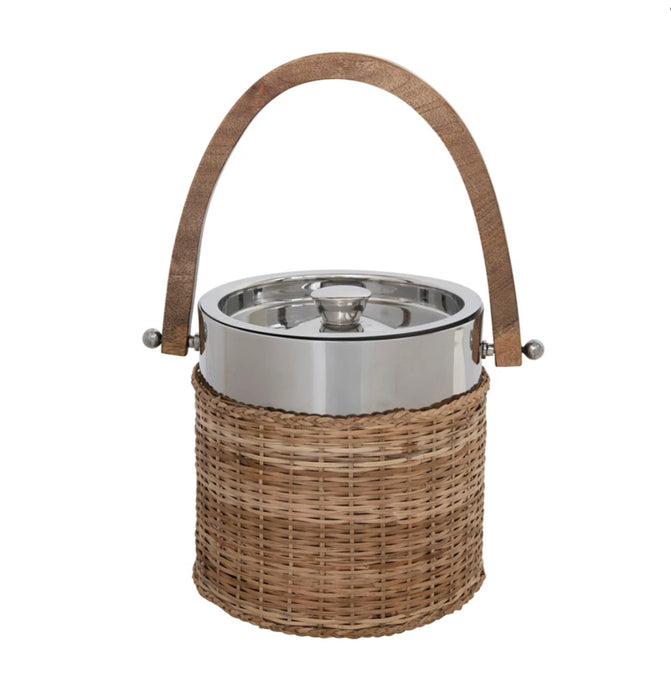 Rattan ice bucket. Stainless steel bucket is wrapped in hand woven rattan with a natural wood handle. The perfect natural accent to any bar cart. 7.5"H