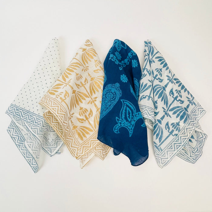 Collection of Block Print Bandanas from By the Sea Organics. Charming tropical block prints on 100% organic cotton. 21" square. Each sold seperately.