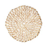 Round shell trivet made from threading cowrie shells together in a circular pattern. Measures 8" diameter.