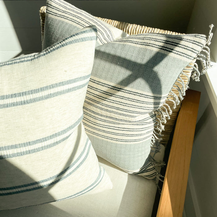 Our Laguna pillow shown with our Fringe  Mia Pillow cover. Both a part of the limited edition Laguna Collecition. Inspired by the coast in a palette of sand, foggy blues & indigo. Each sold separately