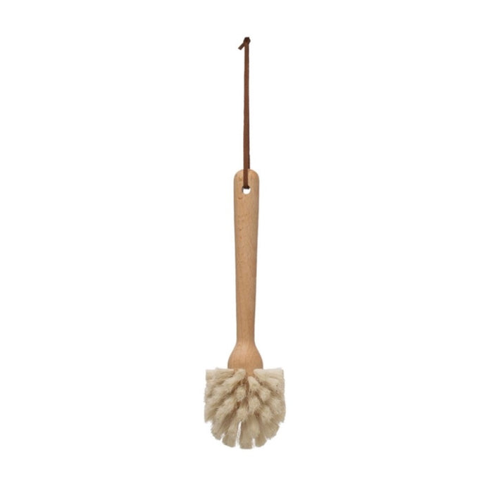 Beech wood dish brush with leather strap. Measures 10"L