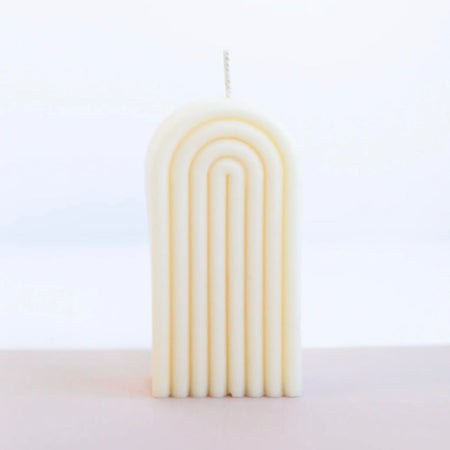 Tall Arch candle in cream. Hand poured in 100% American grown unscented soy wax. 4.2" H x 2.5" W x 1.5" D