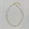 Pearl and rainbow seed bead choker necklace.