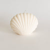 Seaside Shell candle in ivory adds soothing beach vibes to any space. Makes a great gift . Hand poured in California with 100% unscented soy wax. Measures 3" H 4" W.