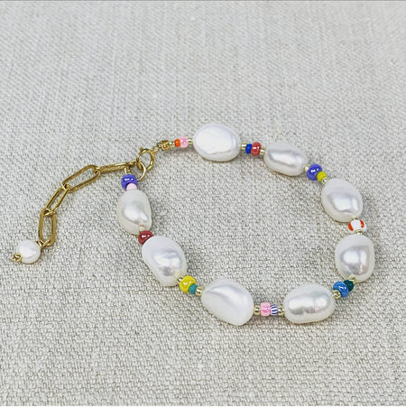 Fresh water pearls and multi colored seed bead bracelet.