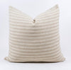 White Sands Pillow is made by artisan weavers in Thailand. Handwoven in a cream and sand stripe with a  subtle texture. A sophisticated layer for any modern, coastal or bohemian decor. Measures 20" x 20". Down insert is included.