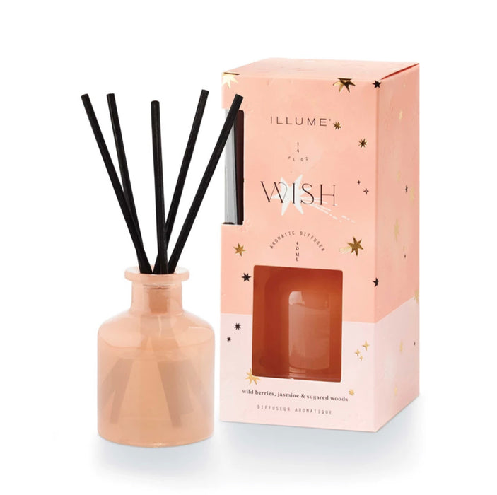 Wish mini diffuser set from Illume. Scent of wild berries, jasmine and sugared woods. Includes glass vessel, 1.4 fluid oz fragrance oil and reed diffuser sticks.