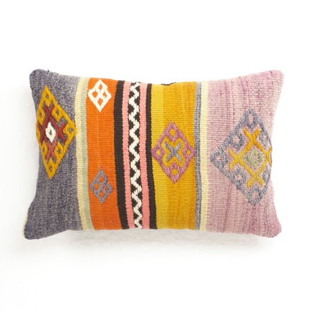 Vintage kilim pillow with violet, orange, saffron, pink and brown stripes. Tan cotton twill back.
